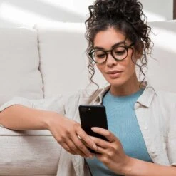 SAWYER - SEA GRASS + CLEAR GLASSES -Glasses Sales Store diff june 2021 female on model Bluelight Sawyer d 0414e8c8 85d9 4802 af02 1f3bef1643f3